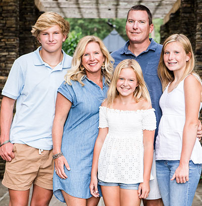 April and Allen Coleman of Coleman Builders with their children